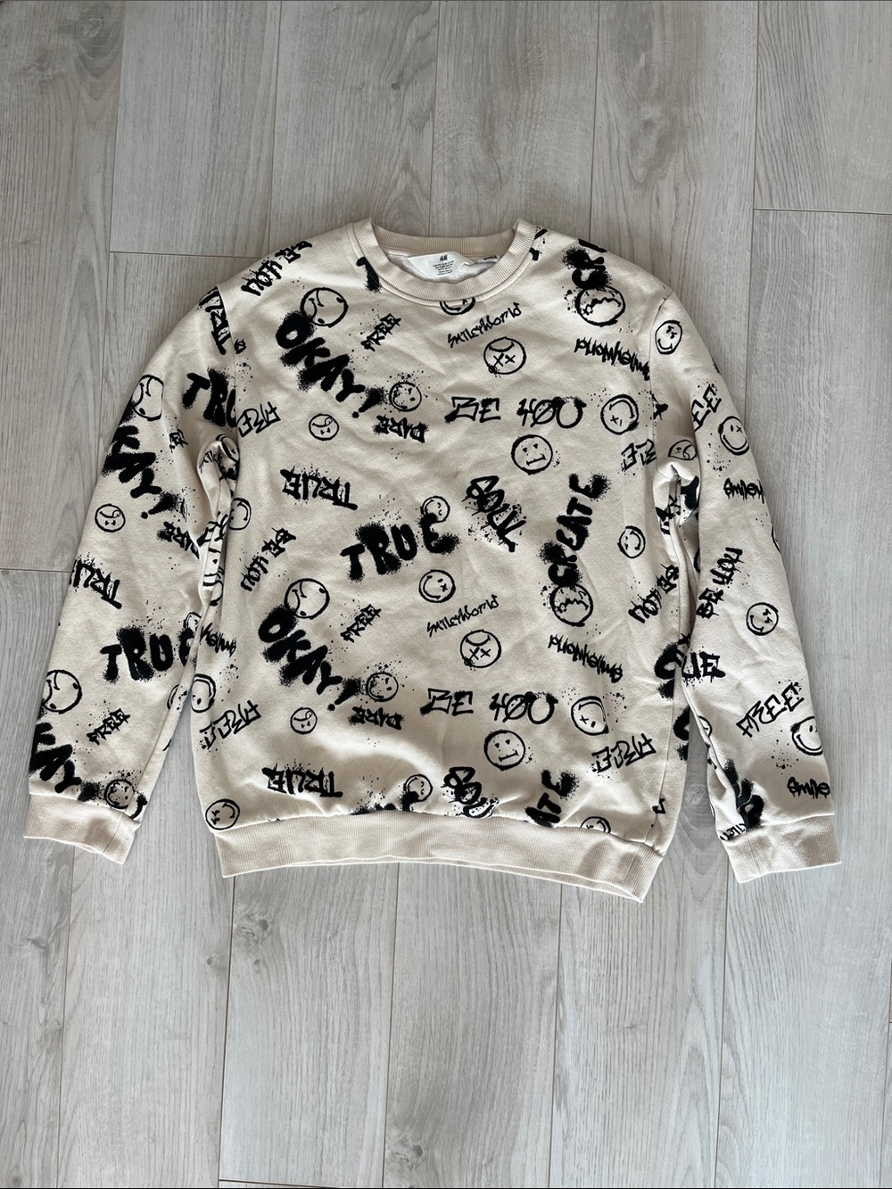 H&M Beige Crewneck Sweatshirt with Black Graffiti Print